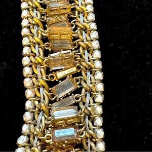 Gold tone and crystal bracelet.